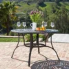 Alfresco Round Cast Aluminum Dining Table - Bronze Christopher Knight Home -Outdoor Furniture Store GUEST 3be182ae dfec 4d71 a6bc 024a641d8eb1
